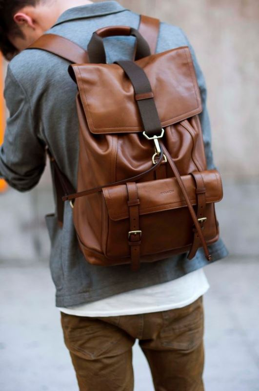a large brown backpacks with many compartments is always a cool idea for a man or a woman