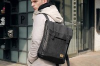 a very laconic and modern black and grey backpack is a stylish accessory for a modern look