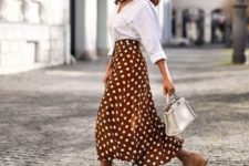 a chic look with an oversized white shirt, a chic brown polka dot midi skirt, nude embellished shoes and a white bag