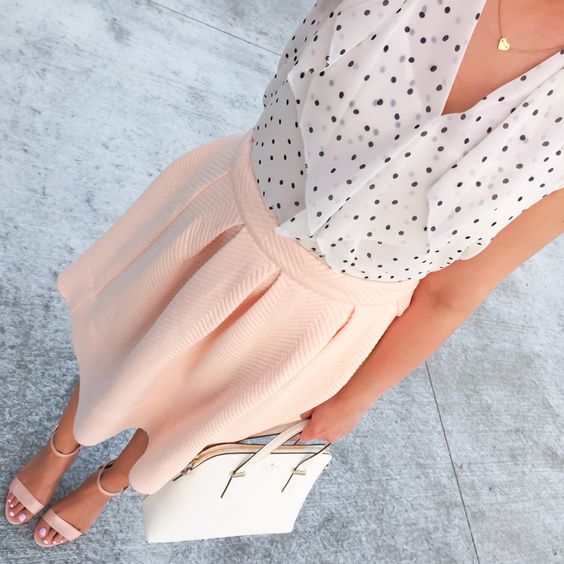 a fresh spring look with a polka dot shirt, a pink pleated knee skirt, blush shoes and a white bag