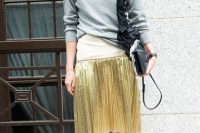Casual look with grey shirt, golden skirt and trendy flats