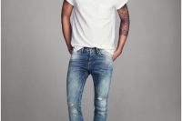 Distressed Skinny Jeans With A Plain White Tee