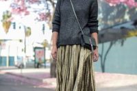 Outfit with grey shirt, metallic skirt and white sneakers