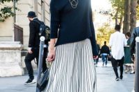Outfit with metallic skirt and black sweater