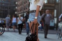 Simple White Blouse With Ripped Denim Shorts