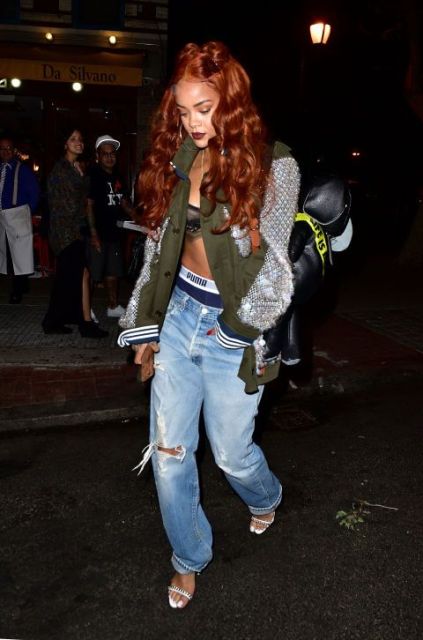 Trendy Rihanna's look with low-slung jeans and sandals