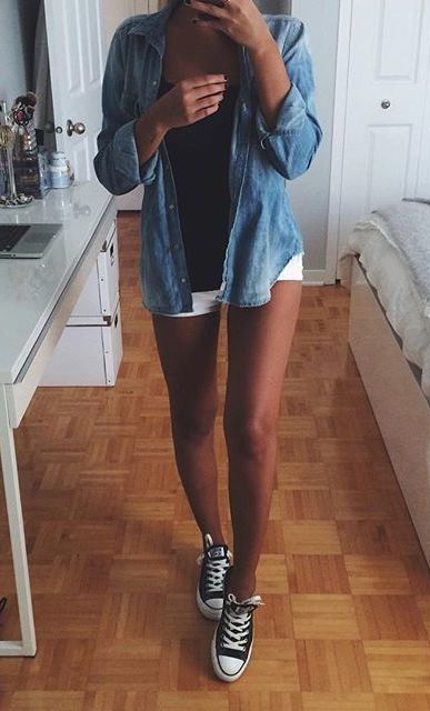 chambray shirt with a black top, white shorts and black converse