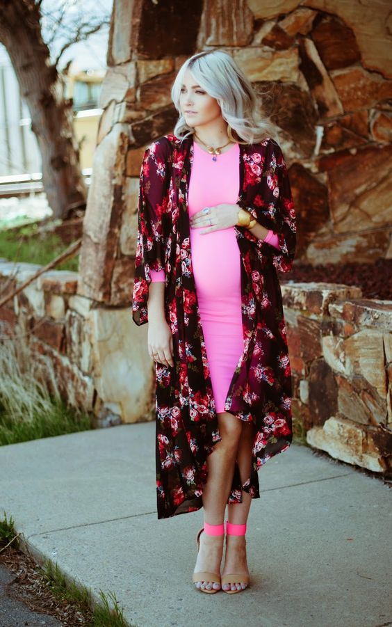pink maternity dress with a floral cover
