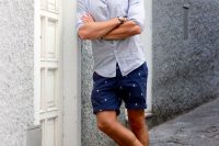 14 printed navy shorts and light blue shoes