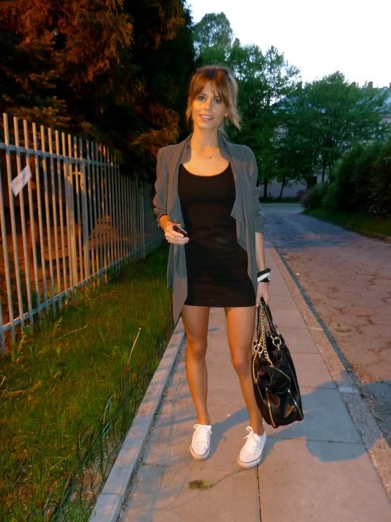 simple black dress, a loose jacket and white sneakers