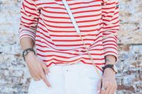 14 white shorts and a red and white striped shirt