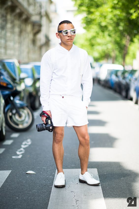 white shorts and a long-sleeved shirt with white shoes