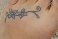 18 flower foot tattoo