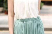 19 soft summer layering of a white top and a pleated skirt