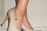 22 heart foot tattoo