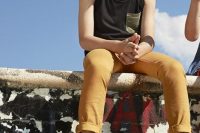 23 yellow pants and a sleeveless tee with sneakers