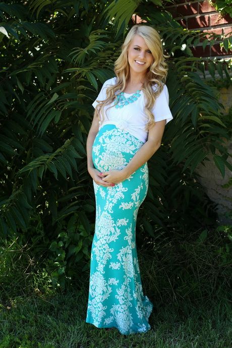 patterned turquoise maxi skirt and a white top for a mom-to-be