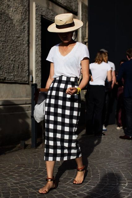 Checked midi skirt and straw hat