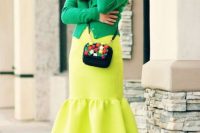 Colorful look with yellow trumpet skirt and green shirt