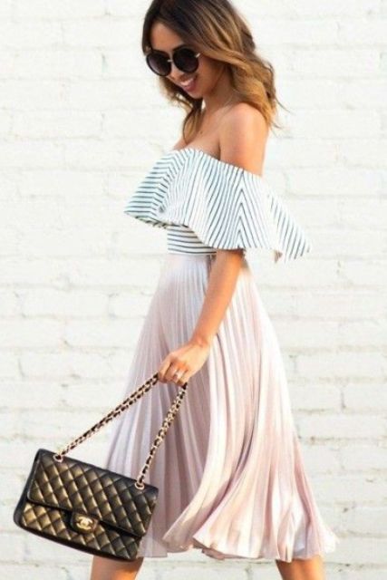 Girlish outfit with off the shoulder ruffle top and pleated skirt