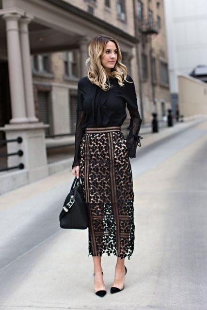 Look with black shirt and black maxi lace skirt