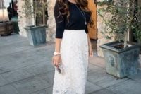 Look with black shirt and midi lace skirt