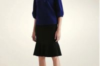 Look with blue shirt and black trumpet skirt