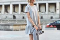 Look with drop waist dress and slip-on sneakers