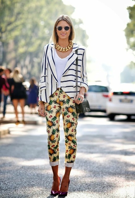 Look with fruit print trousers and striped jacket
