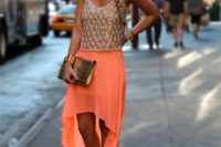 Look with high low skirt and glamorous top