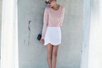 Look with pastel color shirt and white skirt