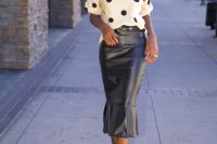 Look with polka dot shirt and leather trumpet skirt