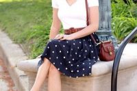 Look with polka dot skirt and leather belt