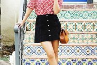 Printed loose shirt and black button front skirt