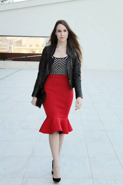 Red trumpet skirt with leather jacket
