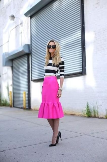 Striped crop top with bright pink trumpet skirt