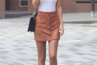 Summer look with top and mini button front skirt