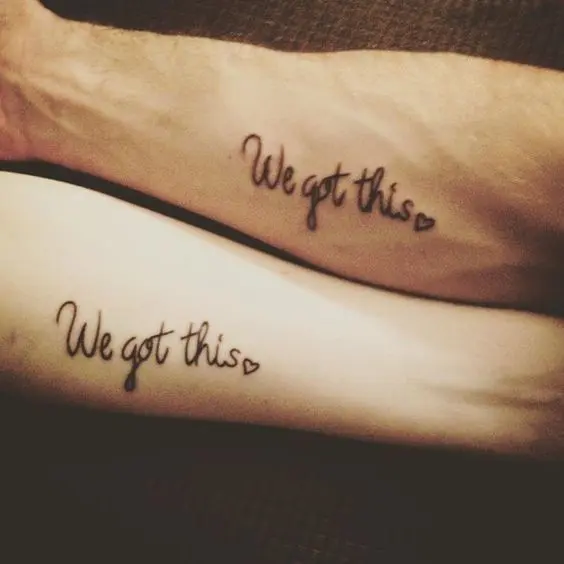 arm phrase tattoo (we got this love)