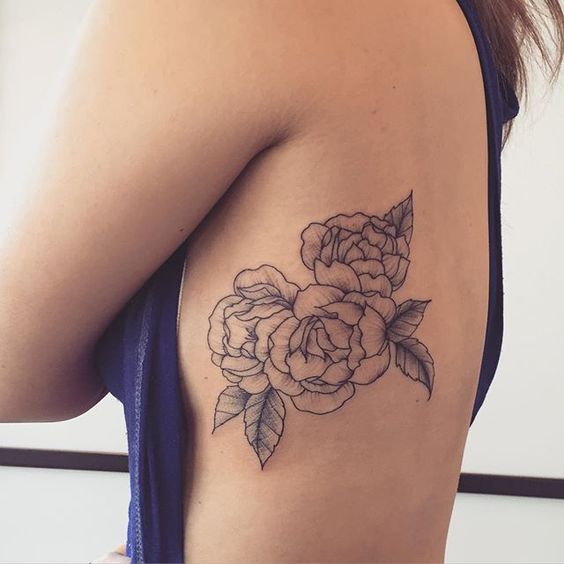 Small rose on the side by Conz Thomas - Tattoogrid.net