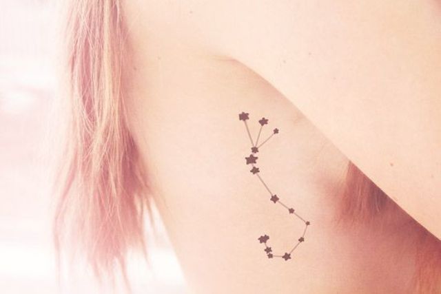 scorpion constellation body tattoo