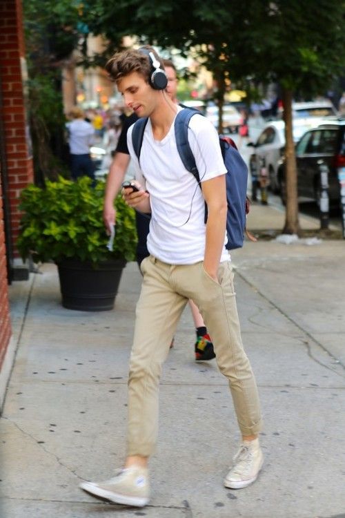 beige pants, a white tee and beige converse