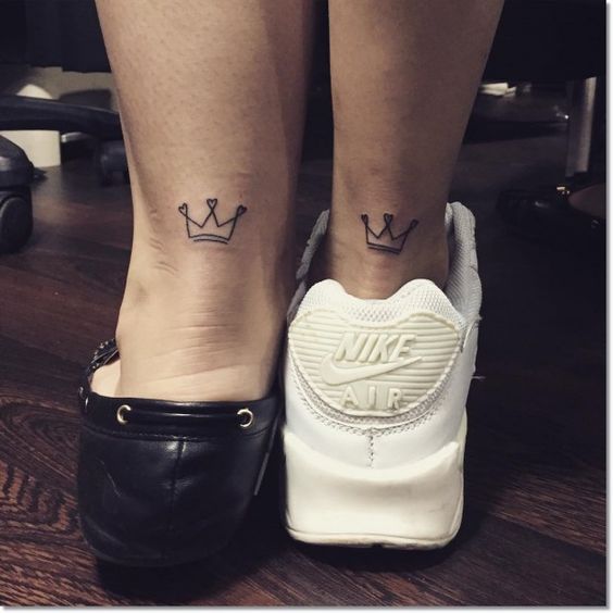 crown leg tattoos for a couple