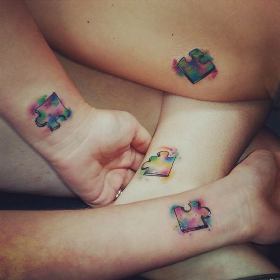 colorful puzzle tattoos for a bunch of friends