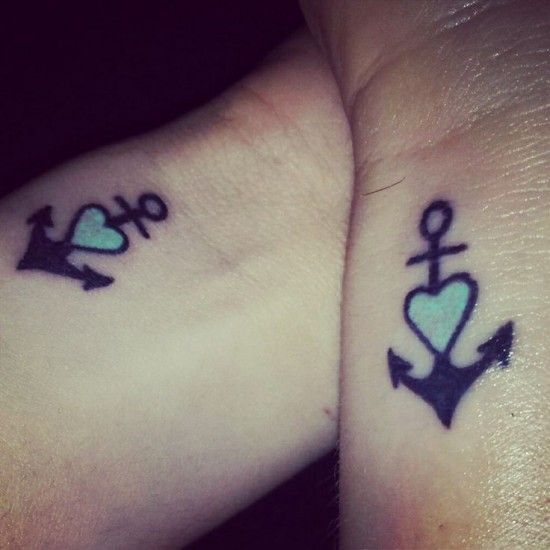 matching love anchors on arms