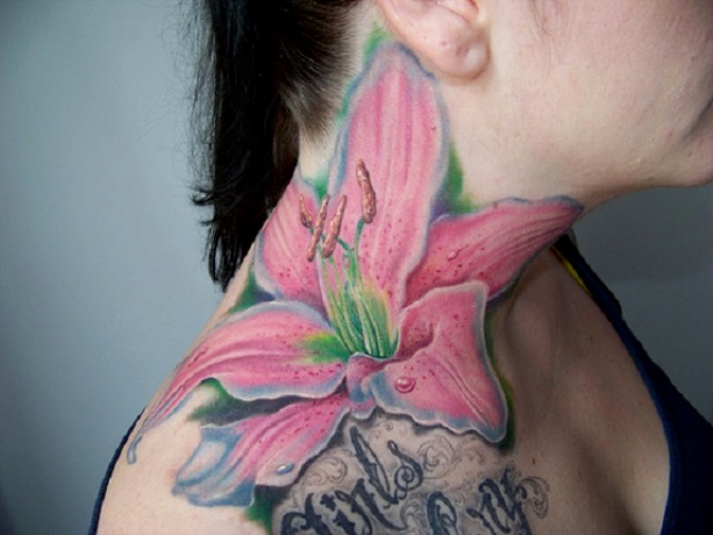 oversized pink lily tattoo on the neck