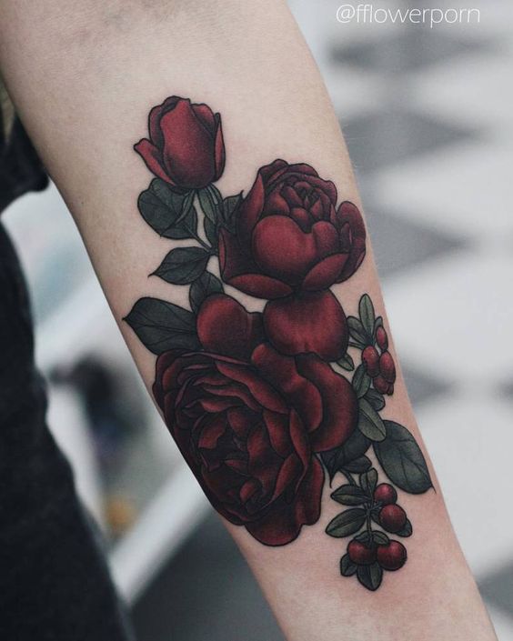 bold rose on the left inner forearm