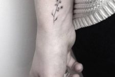 14 delicate flower on a wrist