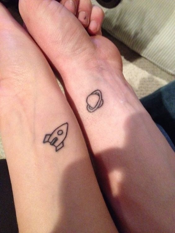 matching rocket and plante tattoos for friends