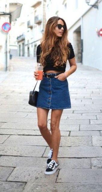 black crop top, a denim button down skirt and sneakers