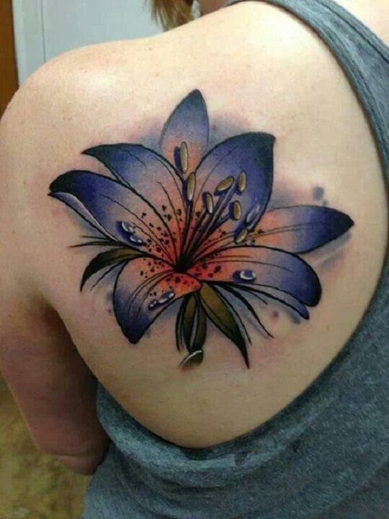 colorful lily on a shoulder